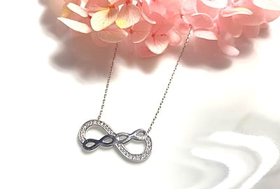 The Triple Infinity Sterling Silver Pendent with Link Chain