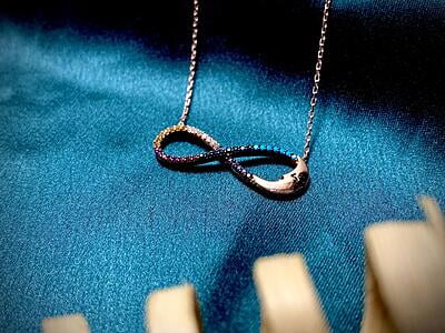 The Infinity Moon Face Pendent with link chain