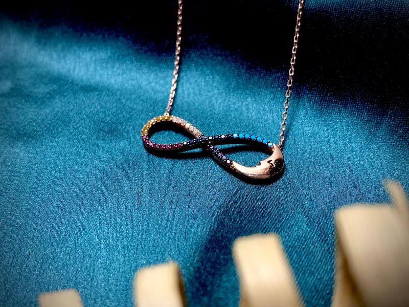 The Infinity Moon Face Pendent with link chain The Infinity Moon Face Pendent with link chain