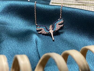 The Multi Color Sterling Silver Angel Pendent with link chain